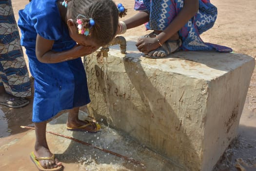 African children at the fountain