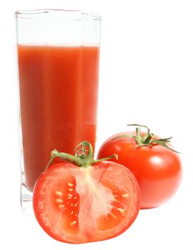 Glass of tomato juice and two tomatoes.