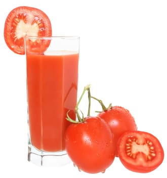 Glass of tomato juice and two tomatoes.