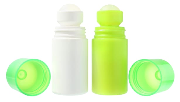 white and green bottles with a deodorant on a white background.