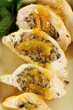 Delicious sliced stuffed chicken with a piquant sauce ready to serve.