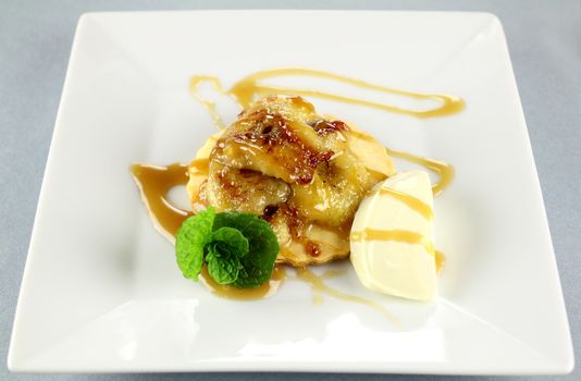 Delicious caramelized banana stack with a rich creamy caramel sauce.