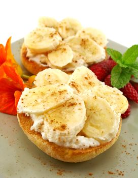 Banana and riccotta muffins with nasturian flowers ready to serve.