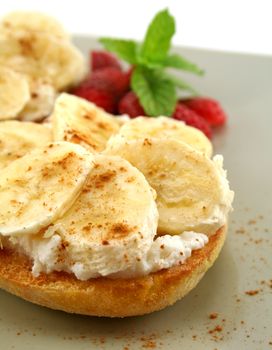 Banana and riccotta muffins with strawberries and mint ready to serve.