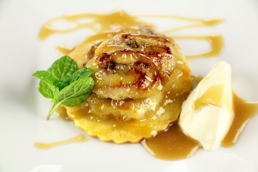 Delicious caramelized banana stack with a rich creamy caramel sauce.