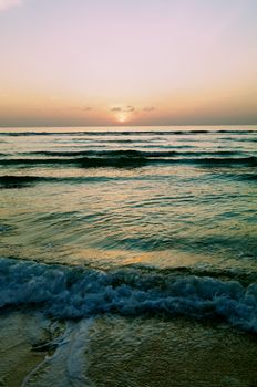 Tropical Sunset on Ocean Waves