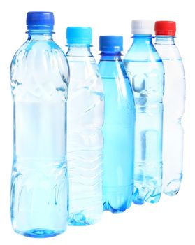 Bottles with water on a white background.