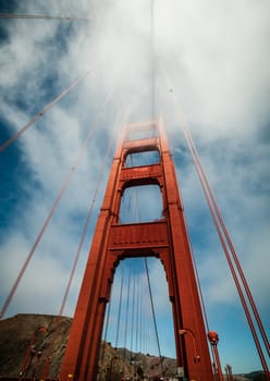 Golden Gate Bridge in San Francisco, California, USA with fog