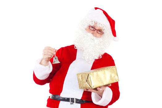 Santa Claus chimes the bell due to Christmas Eve