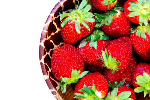 bowl with strawberries isolated on white