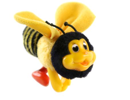 Cute cuddly and colorful bumble bee with heart eyes.