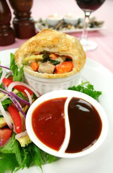 Homestyle chicken and vegetable pie with salad 