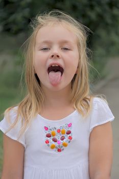 Portrait of girl with smile and makes faces