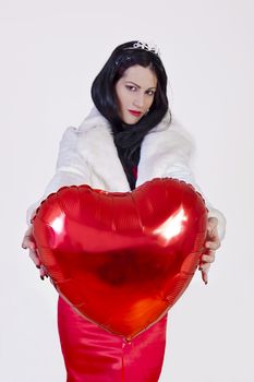 portrait of beautiful girl with shape of heart. valentine day
