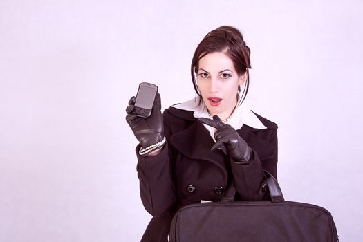 portrait of attractive businesswoman with cell phone