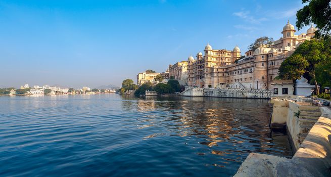 Lake Pichola and City Palace in Udaipur. Udaipur known as the City of Lakes,  Apart from its history, culture, and scenic locations, it is also known for its Rajput-era palaces. Rajasthan, India, Asia