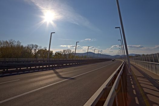 Highway over a bridge with little traffic