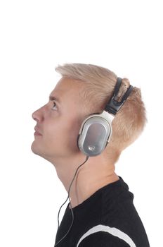 Man in headphones isolated on white, photo in profile