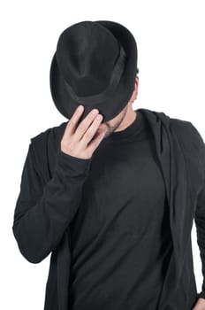 Shot of man who covers his face with his hat