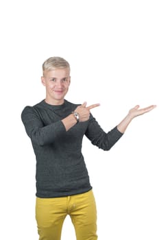 Shot of man in yellow and gray pointing with his fingers, isolated