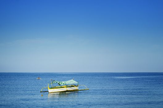 Two small fisherman outrigger off the coast, Philippines