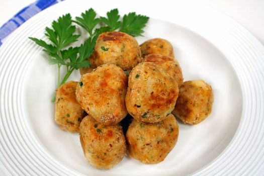 Freshly fried chicken meat balls ready to serve.