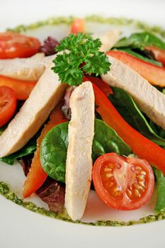 Delightful fresh chicken salad with pesto dressing.