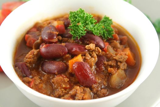 Colorful and spicy chili con carne ready to serve.