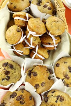 Delicious fresh baked homemade cafe style and mini choc chip muffins.