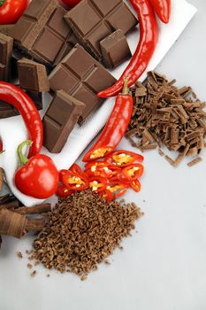 Delicious dark chocolate with a selection of different chilies and peppers.