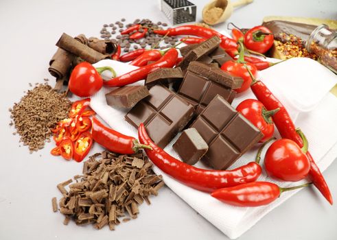 Delicious dark chocolate with a selection of different chilies and peppers.