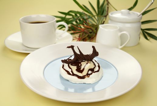 Delicious chocolate meringue with coffee and milk ready to serve.