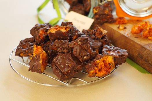 Decadent fresh baked sweet honeycomb dipped in dark chocolate.