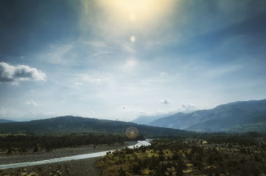 River winding across a grassy plain