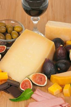 Cheese, wine, figs and olives