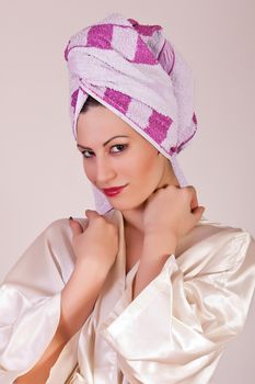 portrait of woman with towel on her head