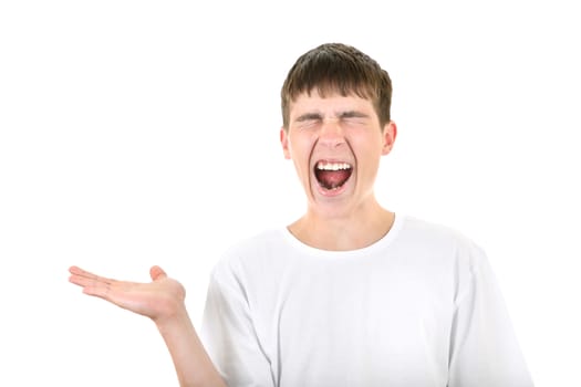 Teenager is screaming and showing his Empty Palm Isolated On The White Background