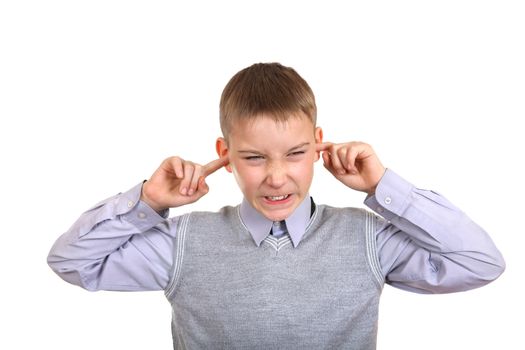 Displeased Boy covering his Ears from the Noise. Isolated on the White Background