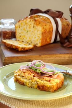 Ham, avocado and red onion on buttered corn bread.