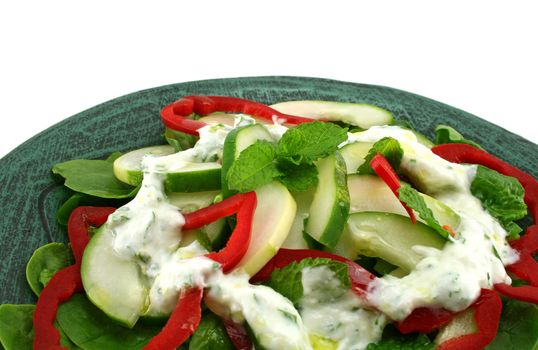 Delicious cucumber and mint salad with red peppers and a coriander yogurt.