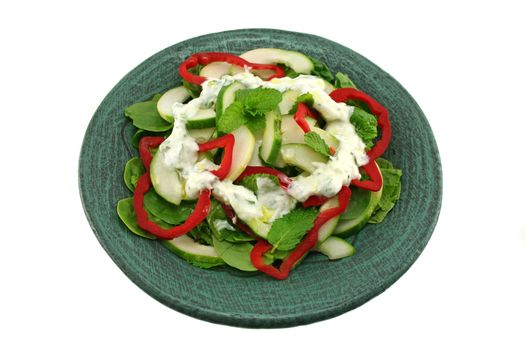 Delicious cucumber and mint salad with red peppers and a coriander yogurt.