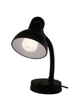Black metal desk lamp with the light bulb on.