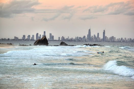 Eerie view of Currumbin Rock looking towards Surfers Paradise on the Gold Coast Australia at a cloudy sunset.