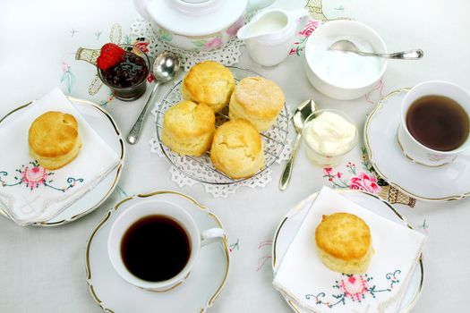 Devonshire tea and fresh baked scones with jam and cream.