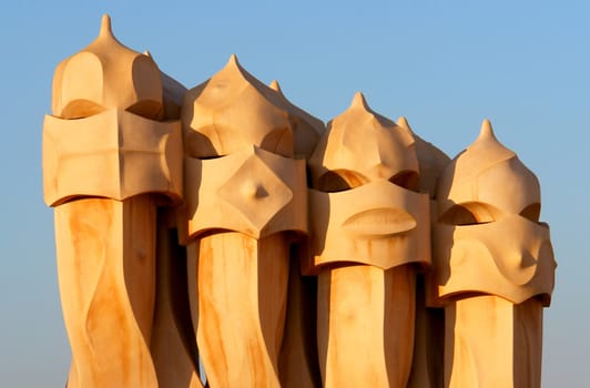 Famous chimneys at Casa Mila (also called La Pedrera) by Antoni Gaudi - roof top - Barcelona                                       