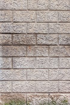 Gray plaster imitating brick wall texture, background