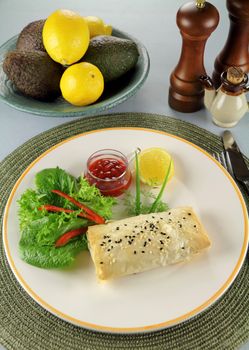 Fresh baked vegetarian carrot and feta filo rolls ready to serve.