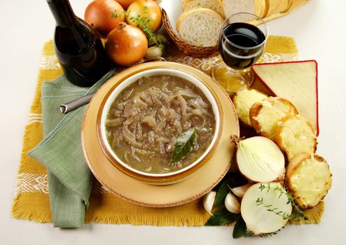 French onion soup with cheese and cheddar rounds ready to serve.