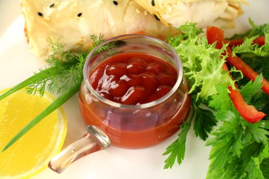 Delicious hot spicy chilli relish served with pastries as a condiment.