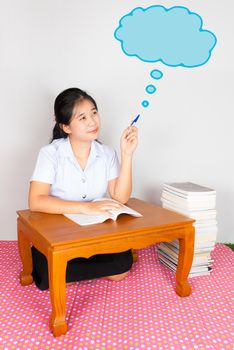 Asian Thai Student points the cloud of thinking or idea